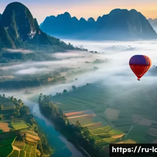 라오스 방비엥 핫에어벌룬 - A colorful hot air balloon gently ascending over the misty, lush green valleys of Vang Vieng at sunr...